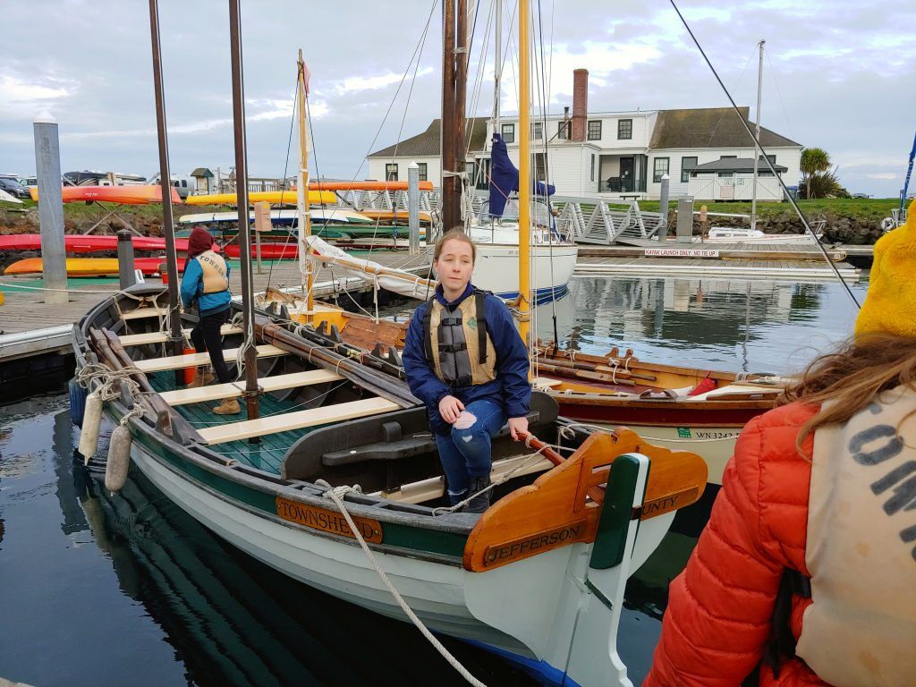 Hand-lining the boats back in place