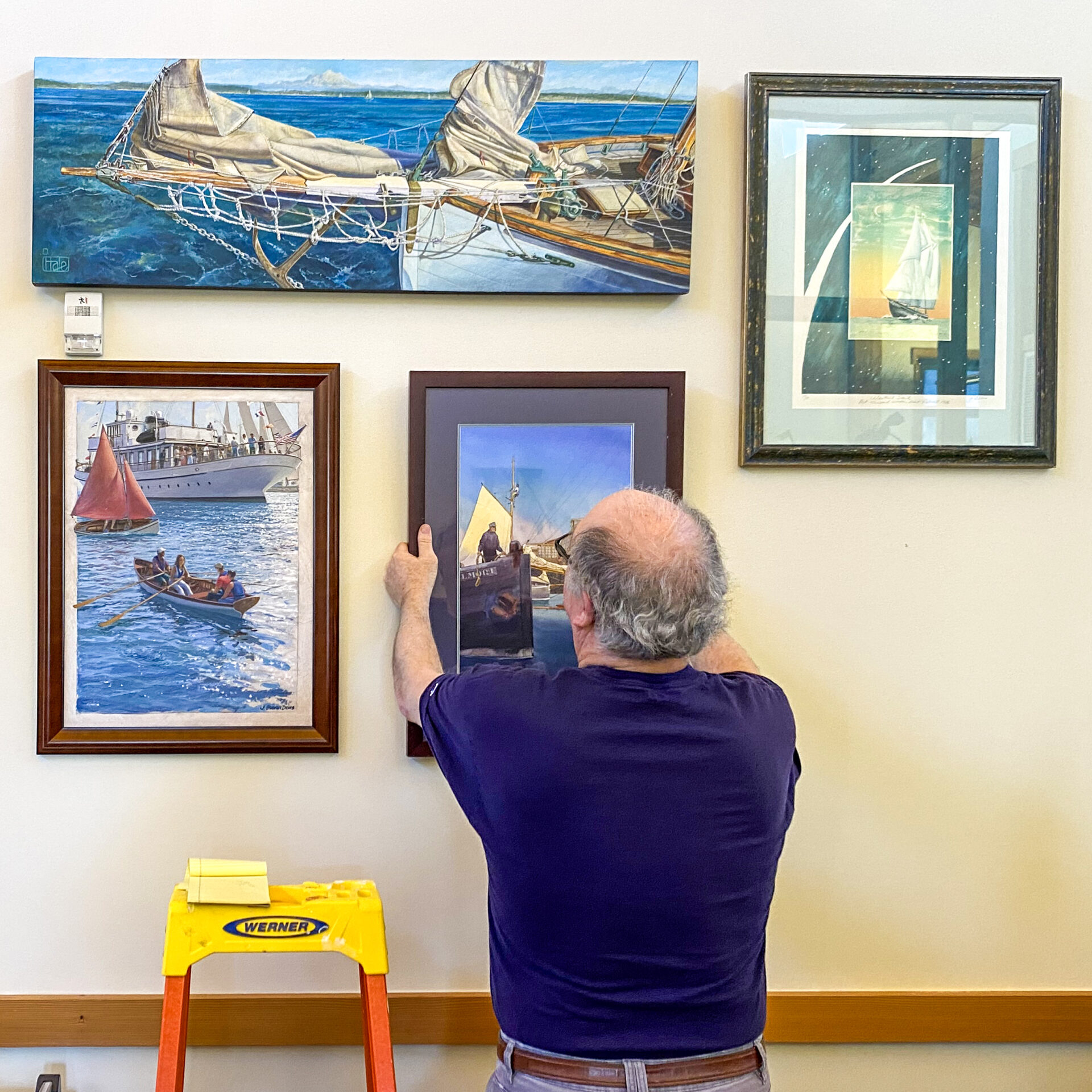 Volunteer Carl Berger hung a wonderful display of maritime artwork in the administrative offices.